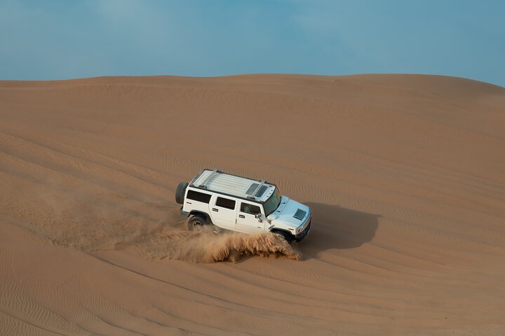 Abu Dhabi: 7-Hours Desert Safari with BBQ, Camel Ride & Sandboarding - Image 1