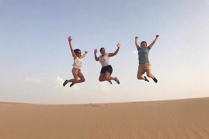 Abu Dhabi: 7-Hours Desert Safari with BBQ, Camel Ride & Sandboarding - Image 4