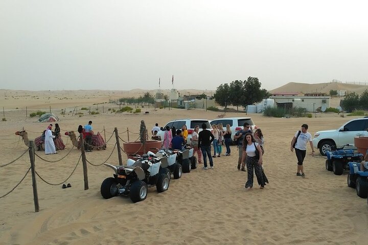 Abu Dhabi: 7-Hours Desert Safari with BBQ, Camel Ride & Sandboarding - Image 5
