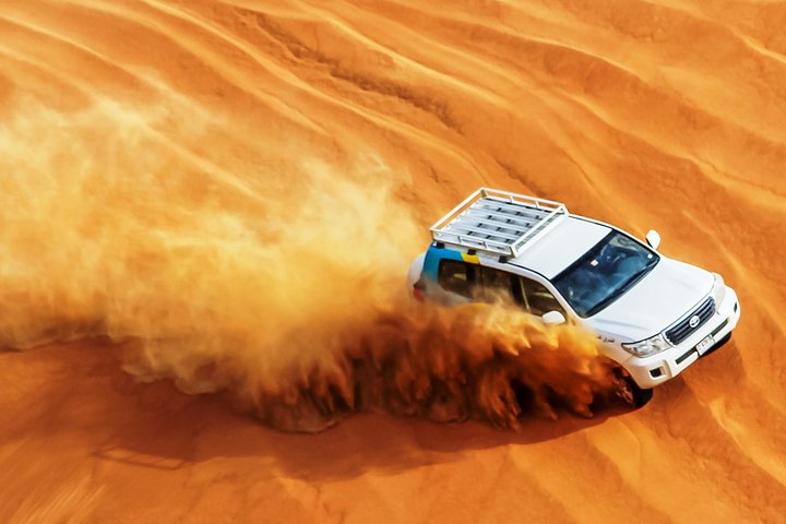 Abu Dhabi Evening Desert Safari with BBQ Dinner and all Camp Activities  - Image 1