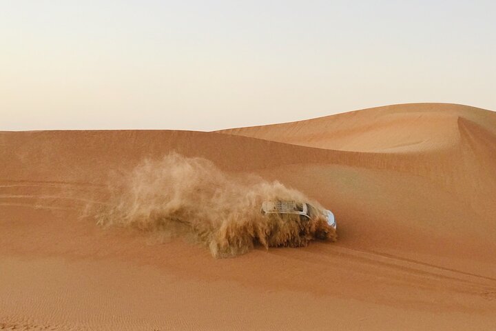 Abu Dhabi Morning Desert Safari,Dune Bashing,Sandboarding,Camel Riding&Quad Bike - Image 4