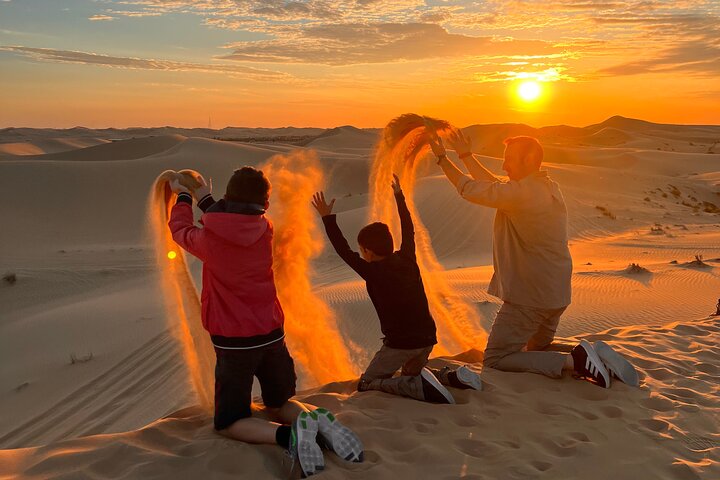 Desert Safari Abu Dhabi w/ Sand Boarding, Camel Ride & BBQ Dinner - Image 3