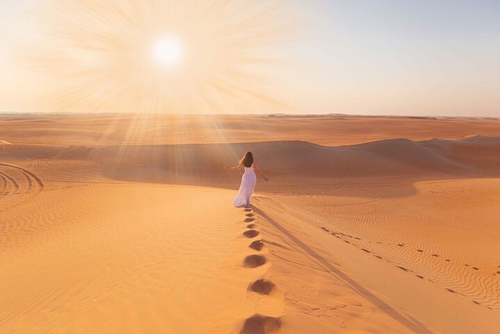 Desert Safari Abu Dhabi w/ Sand Boarding, Camel Ride & BBQ Dinner - Image 1