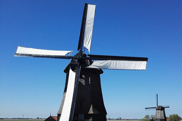 Amsterdam and Countryside Private Full-Day Tour by luxury car - Image 4