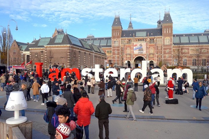Amsterdam in a Nutshell 4 Hour Private Car Tour and Amsterdam Born Private Guide - Image 1