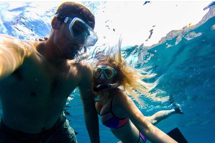 Arch Boat Tour and Snorkeling at Pelican Rock - Image 2
