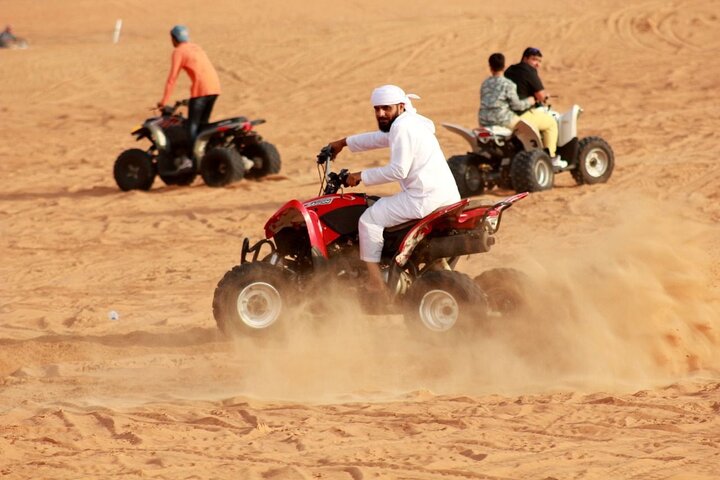 1 HR Self Drive Quad Bike , BBQ Dinner, Sand Boarding, Camel Ride & 3 Live Shows - Image 1
