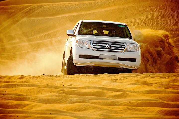 30 Mins Quad Bike, Desert Safari with BBQ Dinner and Camel Ride in Dubai - Image 2
