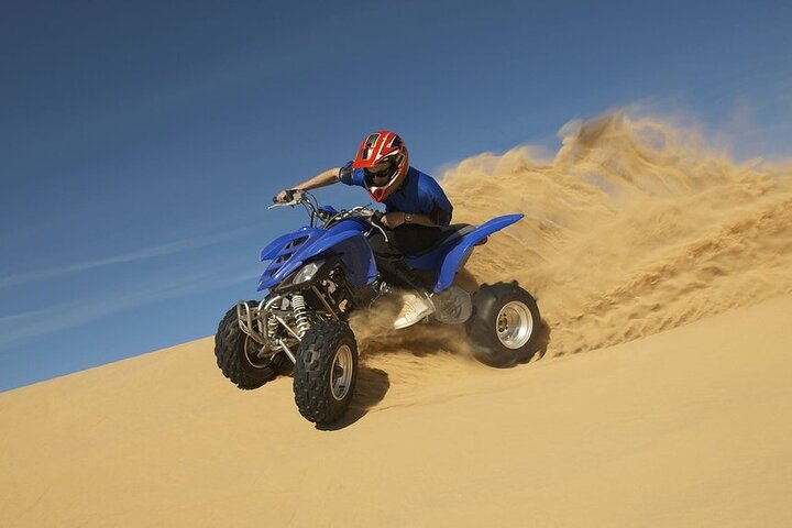 Desert Quad Biking Tour and Sand Boarding with Dinner in Dubai - Image 1