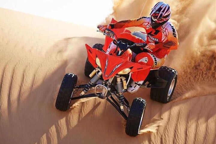 Desert Safari Dubai 25 minutes Quad Bike Free Camel Ride BBQ Dinner - Image 3