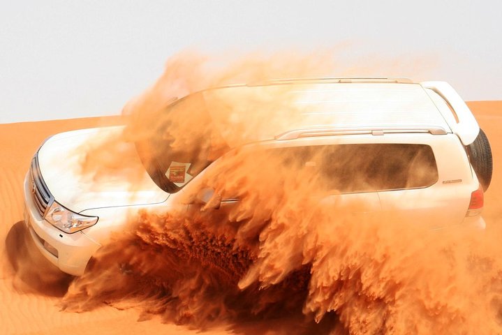 Desert Safari Dubai with Dinner in PRIVATE Luxury 4*4 Vehicle - Image 1