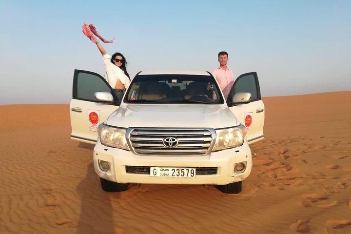 Desert Safari Dubai with High Dunes Bashing and 3 Shows with BBQ and Dinner - Image 1