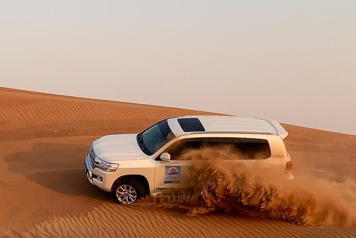 Desert Safari Morning with Camel Ride and Sand Boarding - Image 4