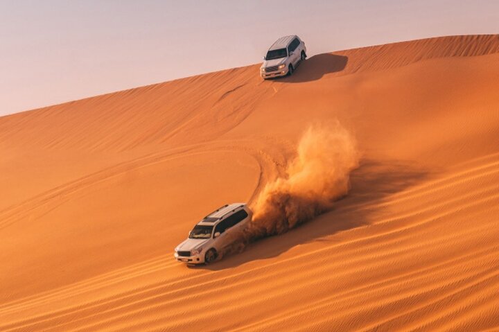 Desert Safari With BBQ Dinner And Camel Ride Experience from Dubai - Image 1