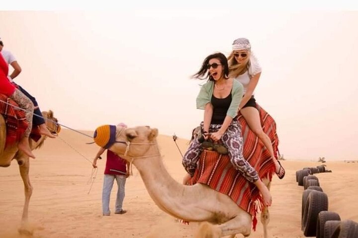 Desert Safari With BBQ Dinner, Camel Ride, Sand Boarding In Dubai - Image 3