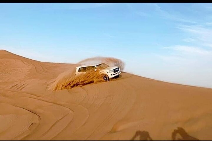 Desert Safari With BBQ Dinner, Camel Ride, Sand Boarding In Dubai - Image 1