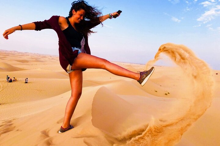Desert Safari With BBQ Dinner, Quad Bike And Camel Ride Experience from Dubai - Image 4