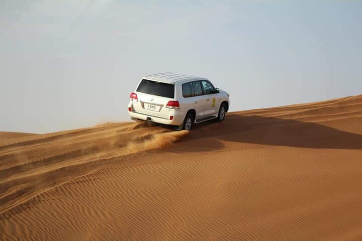 Desert Safari with Dune Bashing, Camel Ride & BBQ Dinner - Image 4