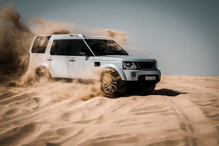 Desert Safari with Dune Bashing, Camel Ride & BBQ Dinner - Image 1