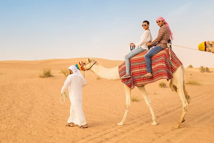 Desert Safari With Quad Bike, BBQ Dinner and Camel Ride Experience from Dubai - Image 1