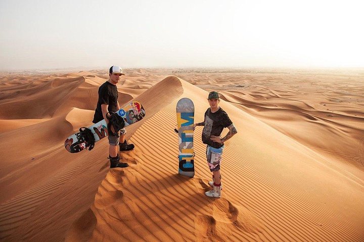 Desert Safari with Quad Bike Sand Boarding and a Camel Ride - Image 4