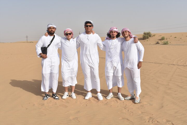 Dubai: 45-Minute Self-Drive ATV Quadbike, Camel Ride, Sand Surfing - Image 4