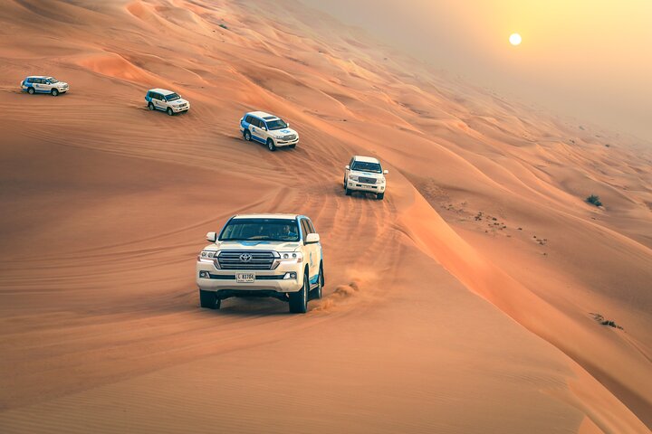 Dubai 4x4 Desert Safari, Quad Bike, Camel Ride & BBQ Dinner - Image 1