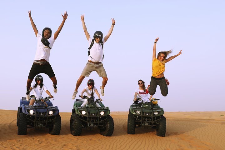 Dubai: Adventure Quad Bike Safari, Sandboarding, Camel Ride & BBQ - Image 1
