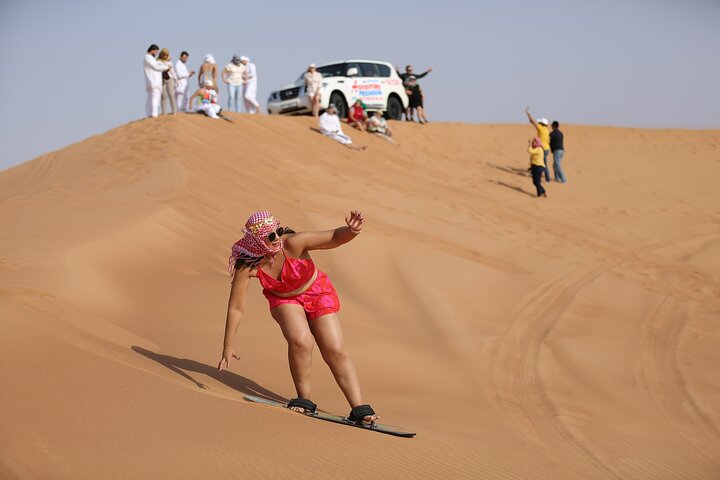 Dubai ATV Self Drive Quad Bike with Camel Ride and SandBoarding - Image 3