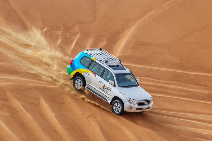 Dubai Desert 4x4 Safari with BBQ Dinner, Camel Ride,Sand boarding - Image 2