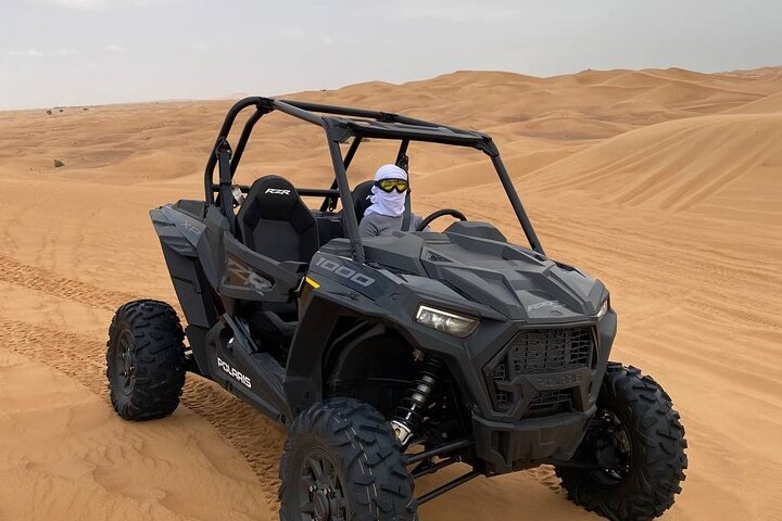 Dubai Desert Dune Buggy Ride, Sand Boarding, BBQ Dinner Camp - Image 1