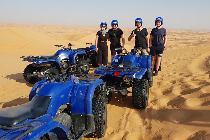 Dubai Desert Quad Bike Ride Adventure And BBQ Dinner Camp - Image 5