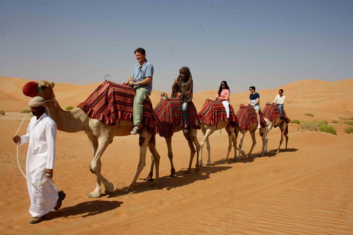Dubai Desert Quad Bike Ride Adventure And BBQ Dinner Camp - Image 4