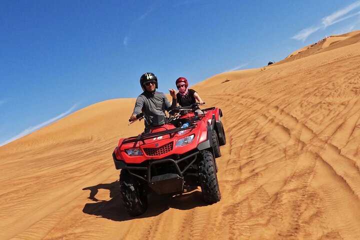 Dubai Desert Quad Bike Ride Adventure And BBQ Dinner Camp - Image 2