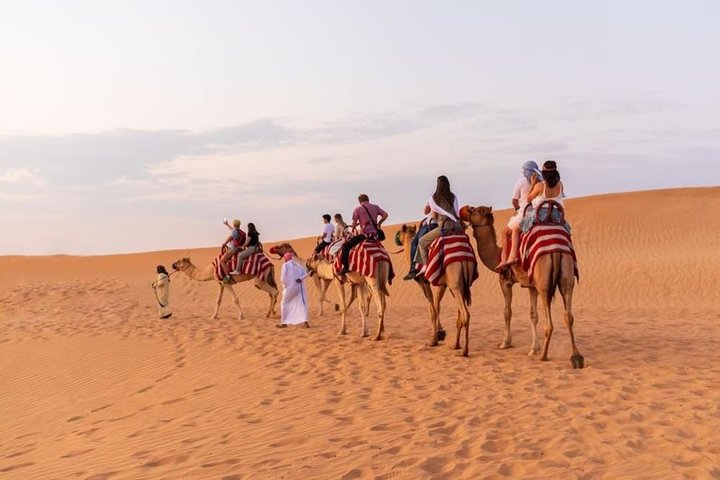 Dubai Desert safari 4x4 Dune Bashing, Sandboarding, Camel Riding, Bbq Dinner  - Image 2