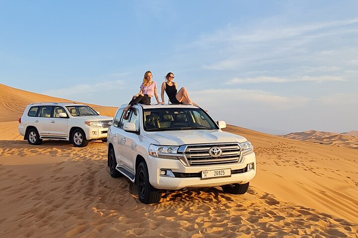Dubai Desert Safari & Buffet Dinner and Camel ride with PRIVATE CAR - Image 4