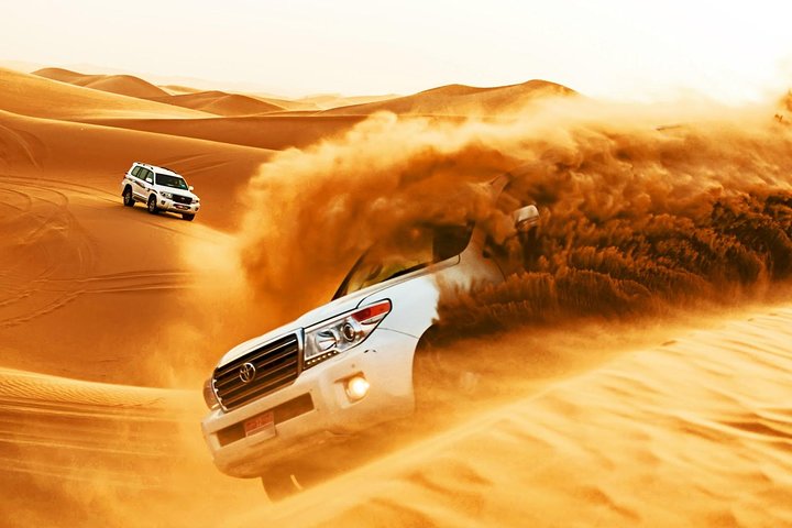 Dubai Desert Safari in Morning with Camel Ride and Sand boarding - Image 1