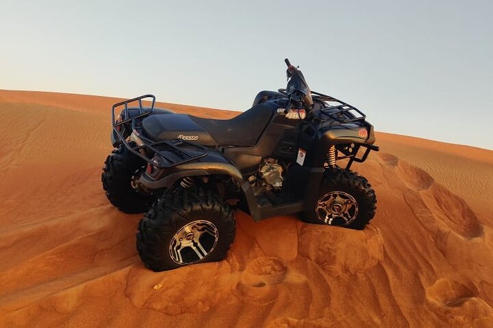 Dubai Desert Safari with ATV(optional)& Sandboarding Experience with BBQ Dinner - Image 1