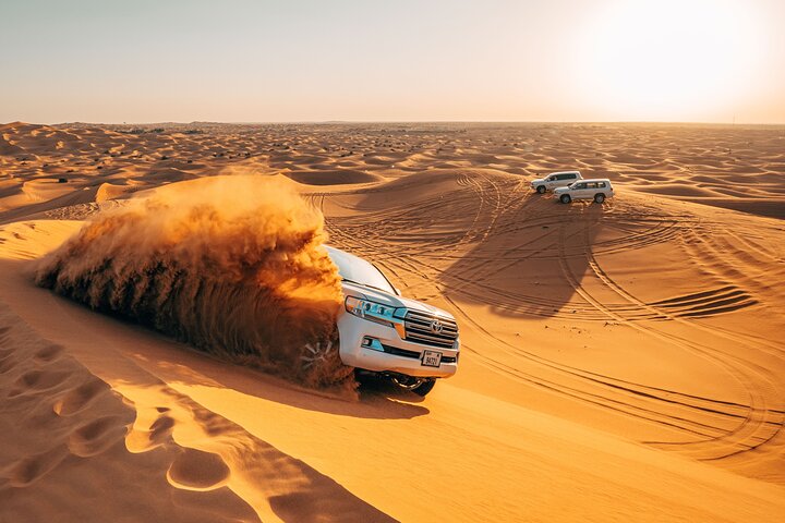 Dubai Desert Safari with ATV(optional)& Sandboarding Experience with BBQ Dinner - Image 2