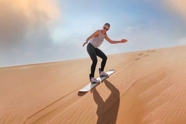 Dubai Desert Safari With Camel Ride and Sand Boarding - Image 2