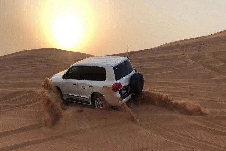 Dubai Desert Safari With Camel Ride and Sand Boarding - Image 1