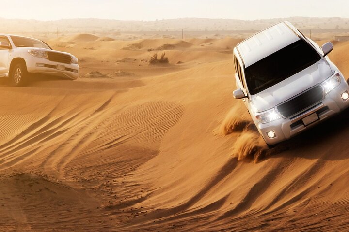 Dubai Desert Safari with Dune Bashing, Camel rides & BBQ Dinner - Image 5
