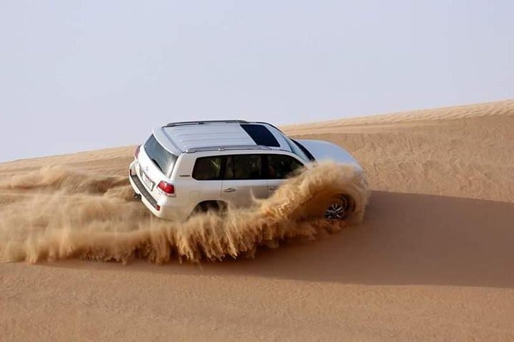 Dubai Desert Safari with Live Shows, Sand Skiing & Boarding, BBQ - Image 1
