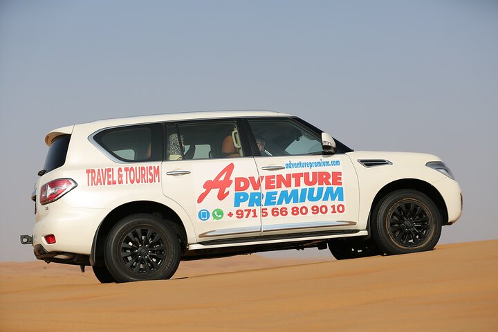 Dubai Desert Safari with Quad Bike, Dune Bashing, Camel Ride, Sand Boarding &BBQ - Image 5