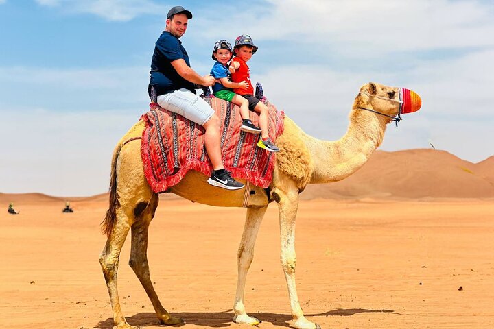 Dubai Evening Camel Safari Adventure with BBQ Dinner - Image 1