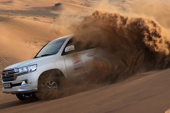 Dubai Evening Desert Safari with Camel Ride, Sand Boarding, BBQ & Entertainment - Image 2
