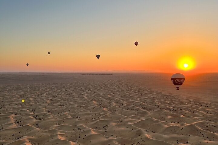 Dubai Hot Air Balloon Tour with Breakfast Camel Ride and Transfer - Image 1