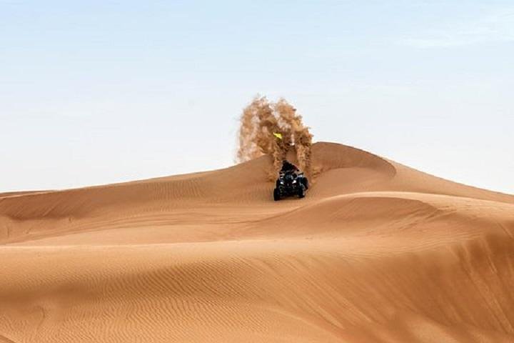 Dubai Morning Desert Quad Bike Tour with Sandboarding & Camel Ride - Image 1