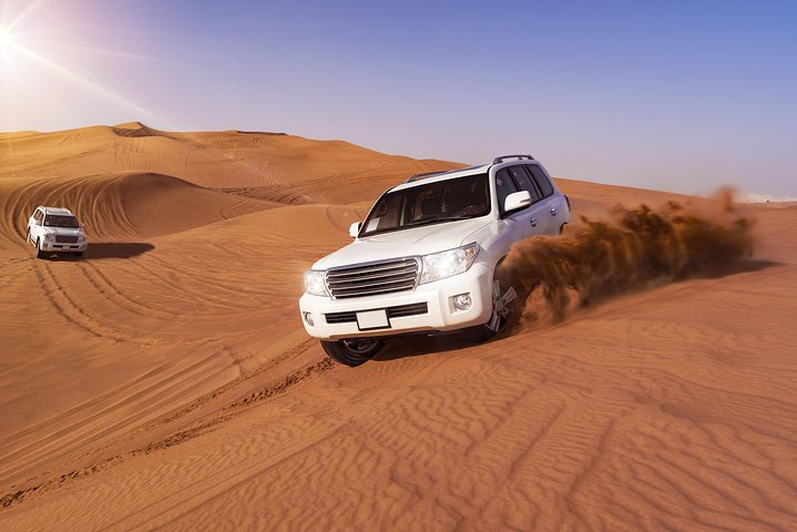 Dubai: Morning Desert Safari, Dune Bashing, Sand Boarding & Camel Ride - Image 1