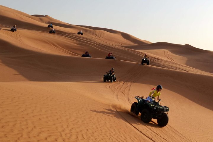 Dubai Morning Quad Bike with Sandboarding and Camel Ride - Image 1